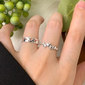 S925 sterling silver hollow heart ring set shown on model for a minimalist chic look