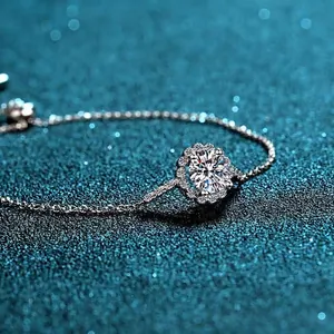 Elegant S925 silver bracelet featuring a 1 carat moissanite halo pendant on starry background