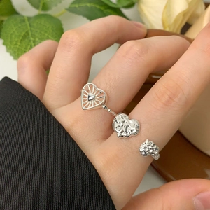 Elegant S925 sterling silver stacked heart ring featuring textured and radiant heart designs