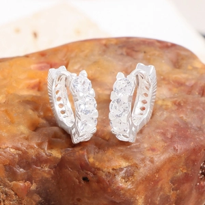S925 Sterling Silver hoop earrings with three brilliant zircons on textured stone