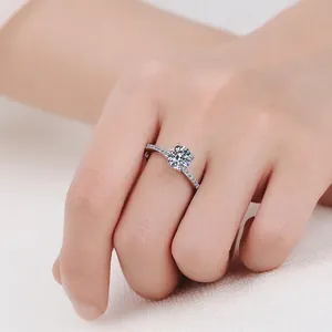 Elegant S925 sterling silver moissanite ring with a classic four-prong crown setting