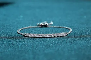 Macro shot of S925 silver bracelet featuring 1.3 carat moissanite stones in prong setting