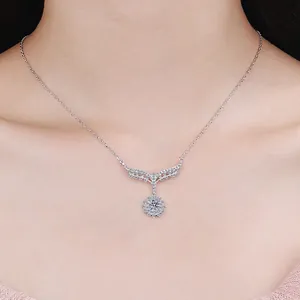 Elegant S925 sterling silver four-prong moissanite pendant necklace on a model