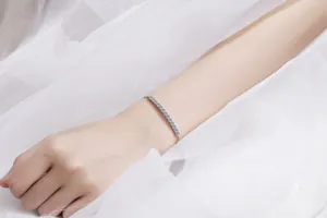 Detail of adjustable S925 sterling silver tennis bracelet with moissanite on wrist