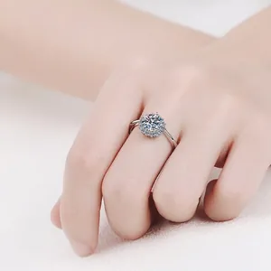 Classic 925 sterling silver sunflower moissanite wedding ring worn on a finger