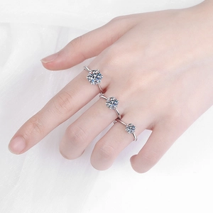 Elegant S925 sterling silver six-prong heart moissanite rings on model's hand