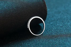 Detailed view of S925 sterling silver band with sparkling moissanite pavé stones