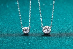 Detailed comparison of S925 silver bubble necklaces with round moissanite pendants