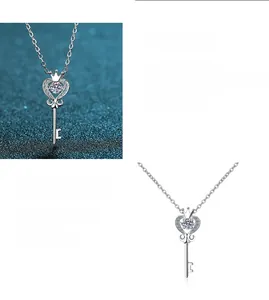 Detailed macro view of S925 silver crown key pendant with Moissanite stone in claw setting