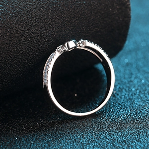 Modern S925 sterling silver ring featuring a row of sparkling round blue moissanite stones