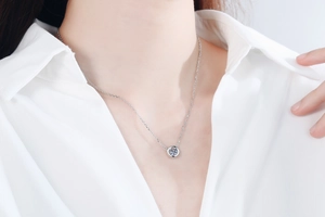 Detailed view of S925 silver bubble necklace with a round-cut 1ct moissanite pendant