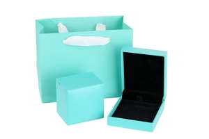 Tiffany blue jewelry gift set featuring a paper bag and necklace boxes with black velvet lining