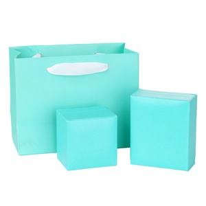 Elegant tiffany blue jewelry gift set with a carrier paper bag and two square gift boxes