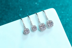 Macro shot of S925 sterling silver moissanite drop earrings with four-prong settings