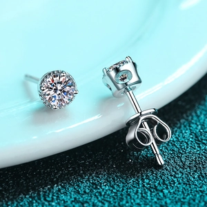 Elegant S925 sterling silver four-claw moissanite stud earrings with a classic round cut