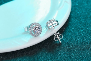 Macro side view of S925 sterling silver moissanite stud earrings with a halo diamond setting