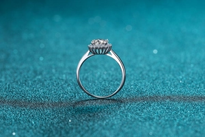Macro side view of S925 sterling silver sunflower ring with moissanite on blue glitter