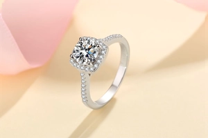 Macro shot of 1ct moissanite square halo silver ring with pave band detail