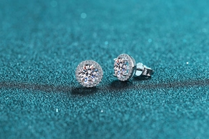 Macro shot of S925 sterling silver hallmark on classic 1 carat round moissanite stud earrings