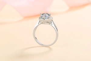 Macro shot of 925 silver ring featuring a six-prong set solitaire moissanite stone