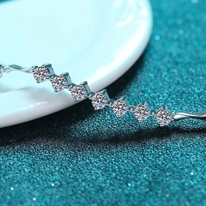 Polished S925 sterling silver moissanite bracelet with round cut stones in claw setting