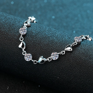 Elegant S925 sterling silver heart bracelet with sparkling round-cut moissanite stones