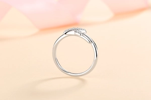 Close-up of S925 sterling silver butterfly ring with sparkling zircon stones and adjustable band