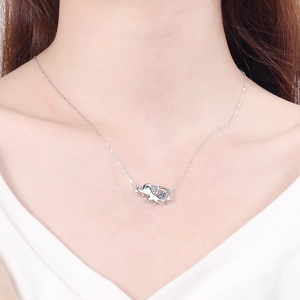Elegant S925 sterling silver necklace with moving moissanite elephant pendant on model