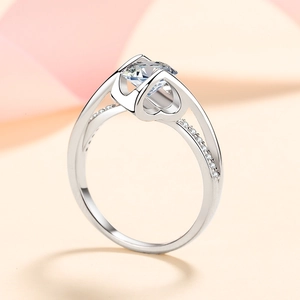 S925 sterling silver moissanite ring featuring a heart-shaped setting and pavé accents