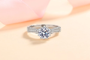 Macro detail of a 925 sterling silver moissanite ring with floral multi-prong setting