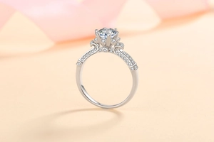 Macro side view of S925 silver ring with moissanite and floral six-prong crown setting