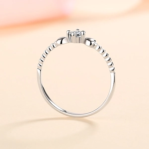 Elegant S925 sterling silver ring with 0.1ct moissanite and bead textured band