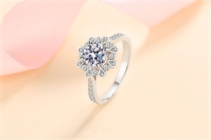 Macro shot of S925 silver ring featuring round moissanite in sunflower halo setting