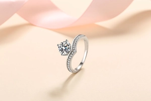 Detailed macro view of S925 silver ring featuring a round moissanite in a pavé twist setting