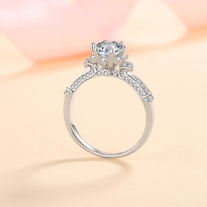 Exquisite S925 sterling silver moissanite ring with six-prong setting and pavé diamonds