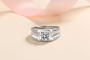 Macro detail of men's silver ring with a 1-carat moissanite stone and pave diamonds