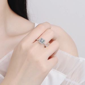 Sparkling 925 sterling silver ring with princess cut moissanite and pave diamonds