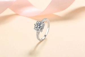 Macro shot of S925 silver ring featuring a round Moissanite and hexagonal halo detail