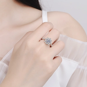 Elegant S925 silver sunflower ring with moissanite stones on a model's hand