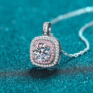 Square silver halo pendant necklace with pink accents and a round brilliant cut stone