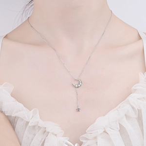 Elegant S925 sterling silver moon and star pendant necklace with sparkling moissanite stones