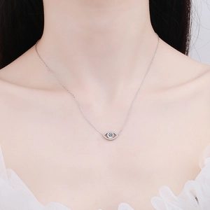Elegant S925 silver angel eye necklace with moissanite pendant worn by a model