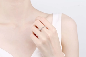 Exquisite 925 sterling silver eternity ring worn by model with shimmering moissanite
