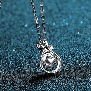S925 sterling silver necklace with a floating dancing moissanite stone in a lucky pouch pendant
