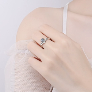 S925 Sterling Silver Crown Ring with V-shape Moissanite stones on a female hand