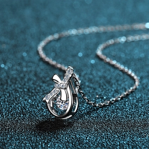 S925 Sterling Silver necklace with butterfly money bag pendant and dancing moissanite