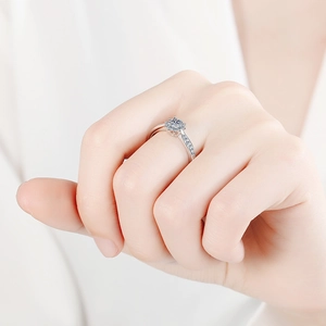 Elegant S925 sterling silver moissanite sunflower ring on woman's hand in close-up