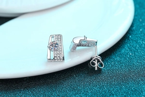 Detailed close-up of S925 sterling silver rectangular earrings with moissanite pave setting