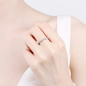 Elegant S925 sterling silver twisted eternity ring with pavé diamonds on finger