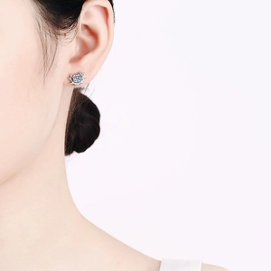 S925 sterling silver reindeer antlers stud earrings with round moissanite on model